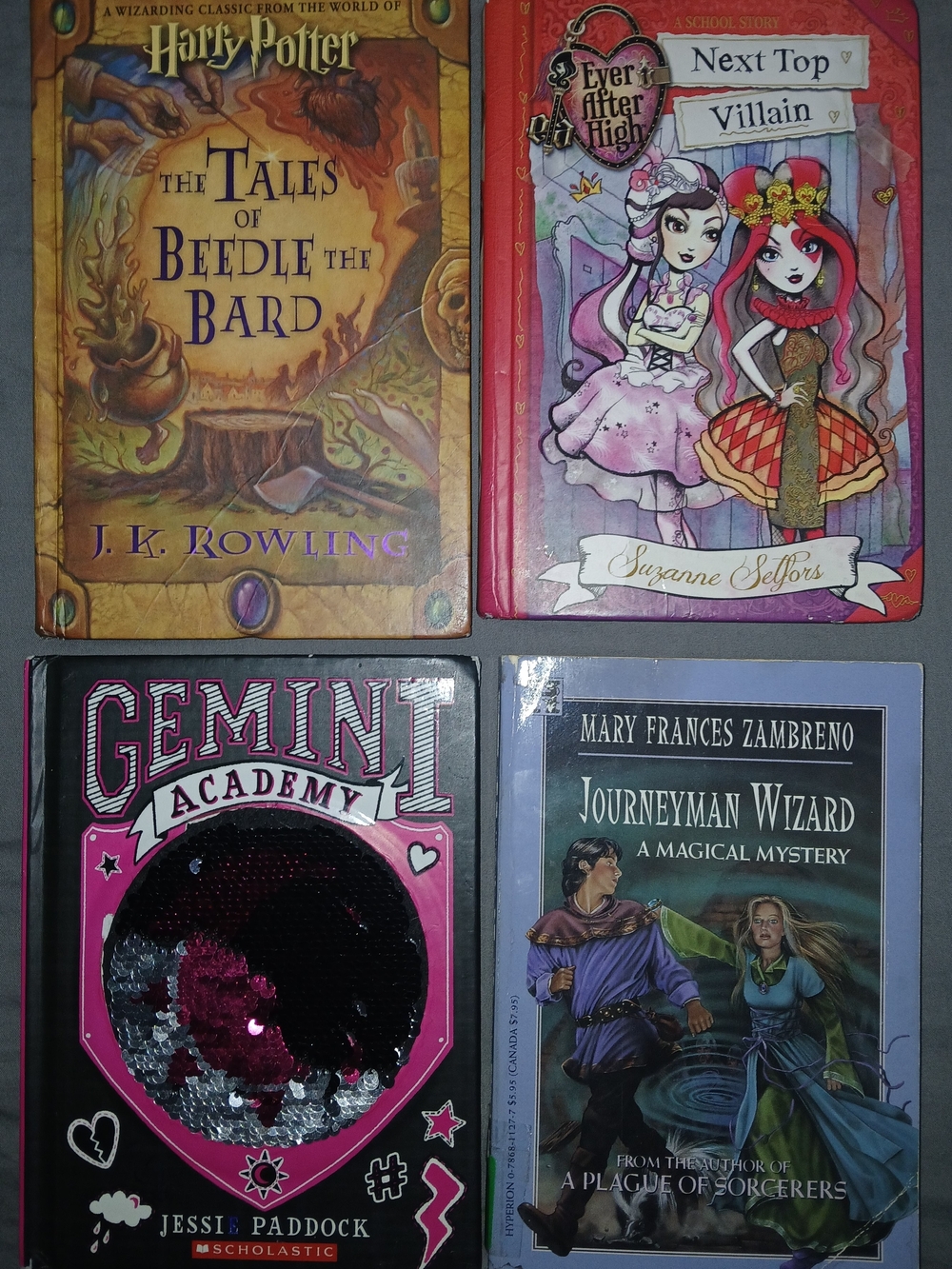 Set of Four Young Fiction Books - Purple, Pink, Gold, Black Covers